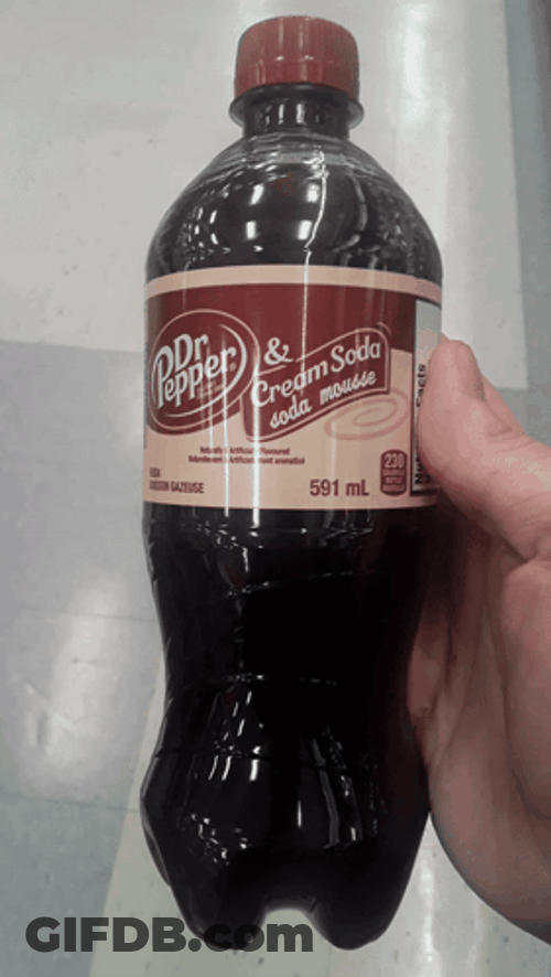 Hand Holding Dr Pepper Bottle GIF