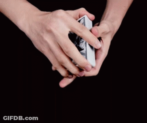 Hand Holding Fan Of Playing Cards GIF