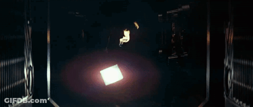 Hand Holding Fireball In Dark GIF
