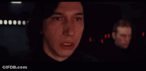 Hand Holding Gun In Dark Room GIF