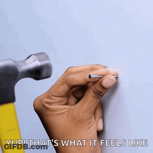 Hand Holding Nail In Front Of Hammer Saying Yup That's What It Feels Like GIF