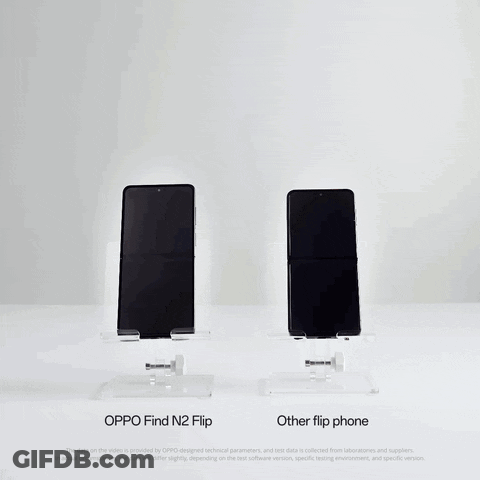 Hand Holding Oppo Find N2 Flip Phone Next To Another Flip Phone GIF