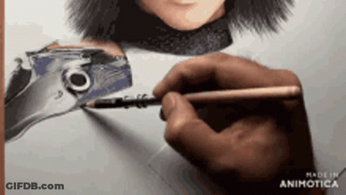 Hand Holding Pencil In Front Of Drawing Of Woman GIF