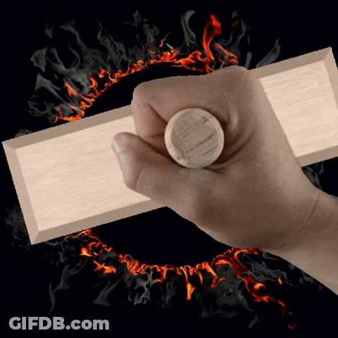 Hand Holding Piece Of Wood With Circle GIF