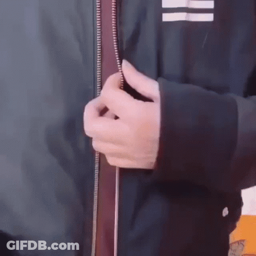 Hand Holding Zipper On Jacket GIF