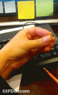 Hand On Keyboard With Sticky Notes GIF
