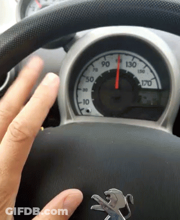 Hand On Steering Wheel With Speedometer At 90 GIF