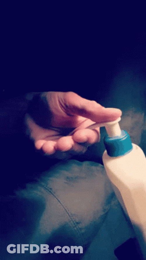 Hand Pushing Lotion Bottle Cap GIF