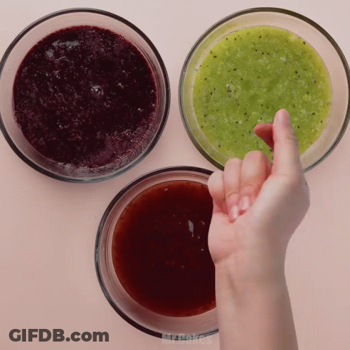 Hand Reaching For Green Sauce In Bowl GIF