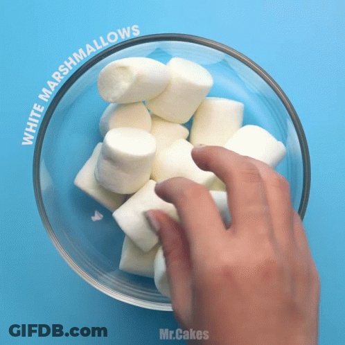 Hand Reaching For Marshmallows In Bowl GIF