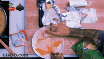 Hand Reaching For Meat On Plate GIF