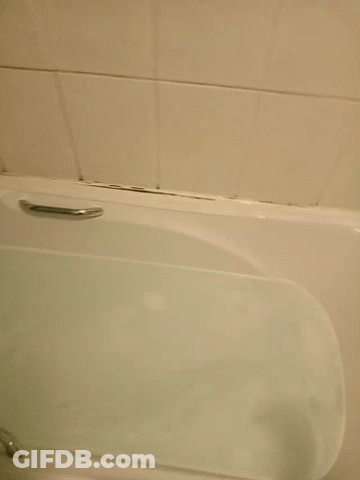 Hand Reaching Into Bathtub GIF