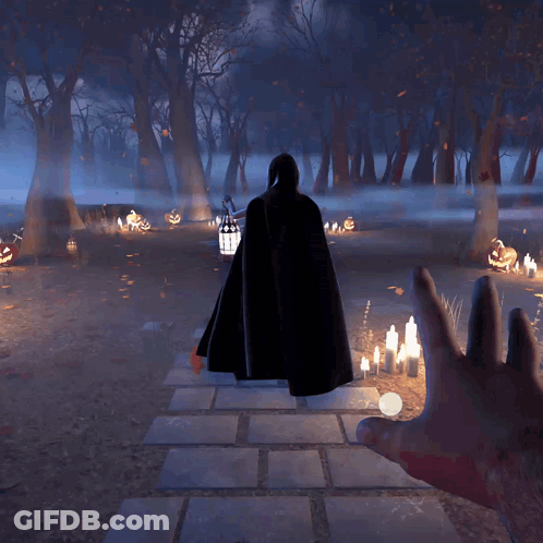 Hand Reaching Toward Man In Black Cape In Dark Forest GIF