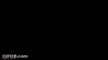 Hand Surrounded By Flames On Black Background GIF