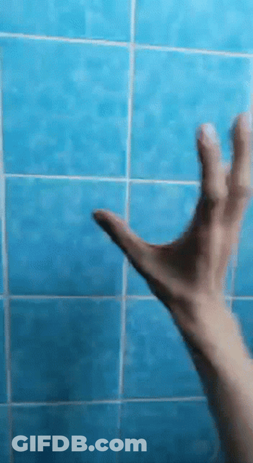 Hand Twitching In Bathroom GIF