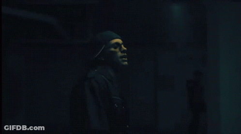 Hand Wearing Mask In Dark GIF