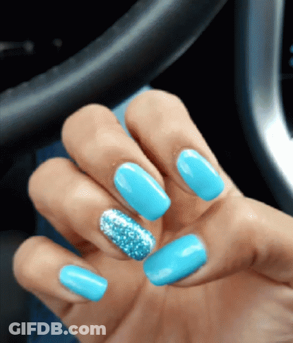 Hand With Blue Nails And Silver Glitter GIF