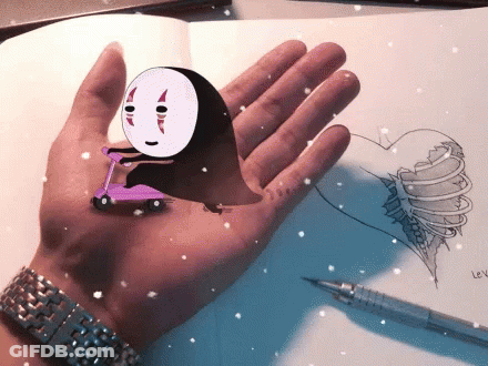 Hand With Drawn Face On Scooter GIF