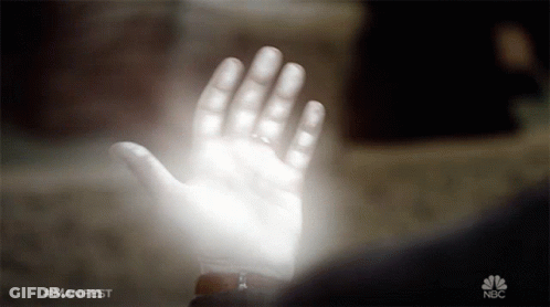 Hand With NBC Logo In Background GIF