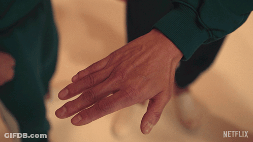 Hand With Netflix Logo GIF
