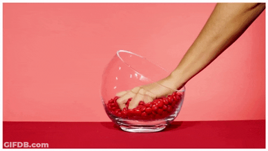 Handful Of Red Candies GIF