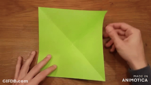 Hands Folding Green Paper Made In Animotica GIF