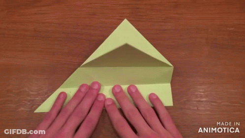 Hands Folding Green Paper With Made In Animotica GIF