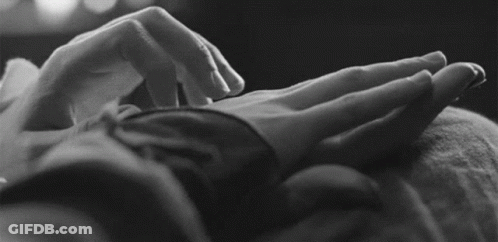 Hands Touching In Black And White GIF