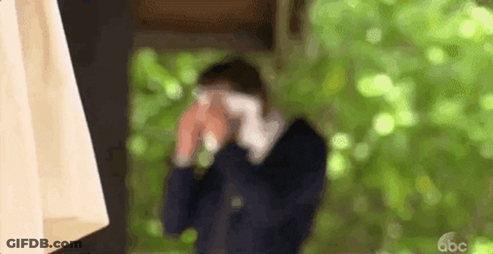 Handsome Guy Sobbing On His Towel GIF