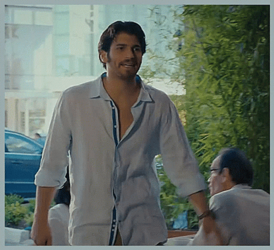 Handsome Guy Waving Hi GIF