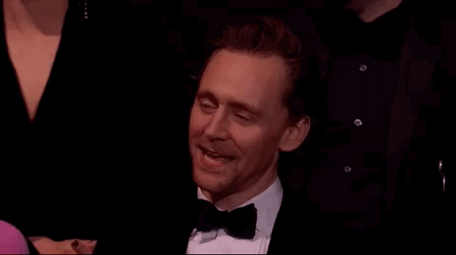 Handsome Tom Hiddleston Laugh GIF
