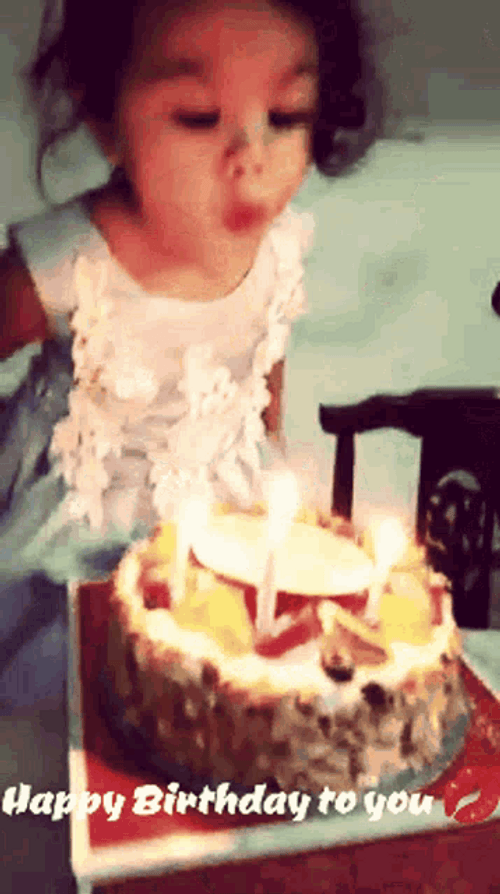Happy Birthday Granddaughter Cute Girl Blowing Candles GIF