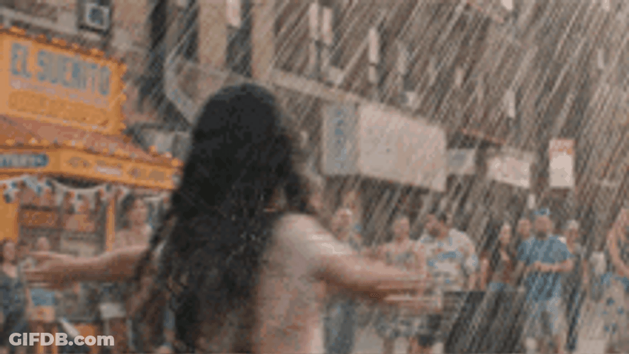 Happy Curly Girl Dancing In The Rain GIF
