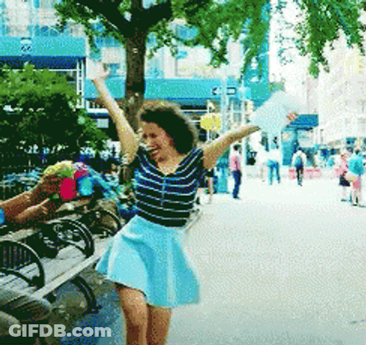 Happy Girl Skipping GIF