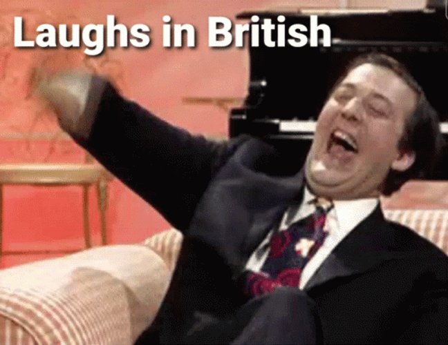 Happy Guy Showing His British Teeth Laugh GIF