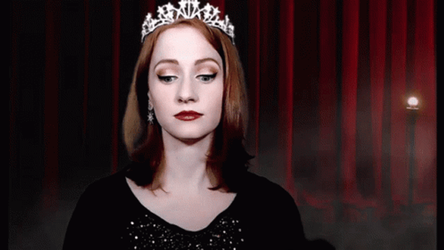 Happy Lady Clutching Pearls GIF