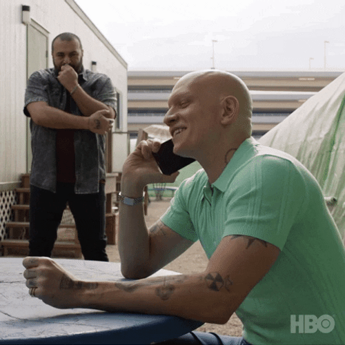 Happy Man Answering Phone Call GIF
