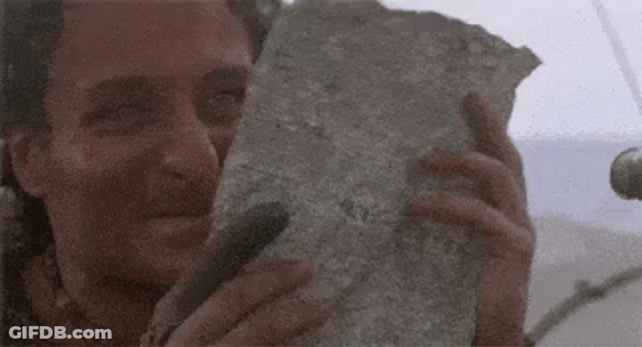 Happy Man Holding Paper GIF