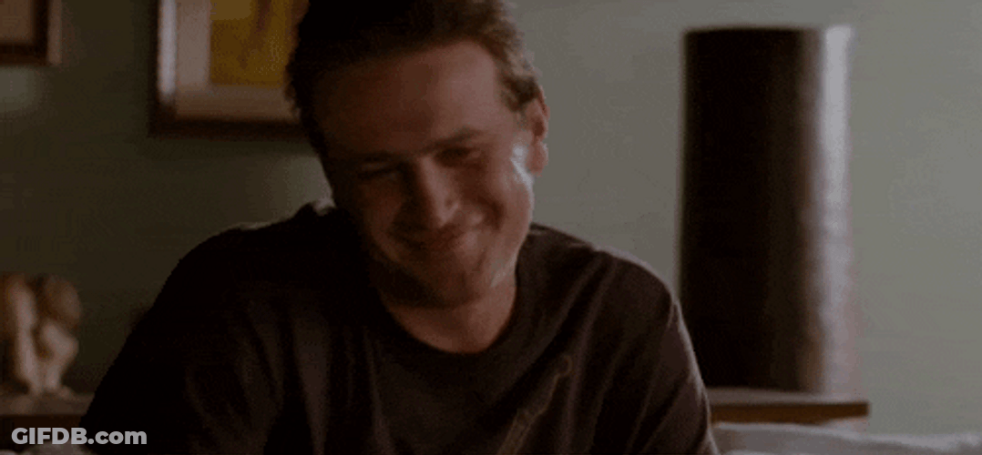 Happy Man Shrugs GIF