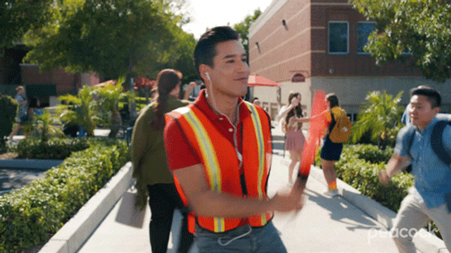 Happy Mario Lopez Metal Detector Dancing GIF