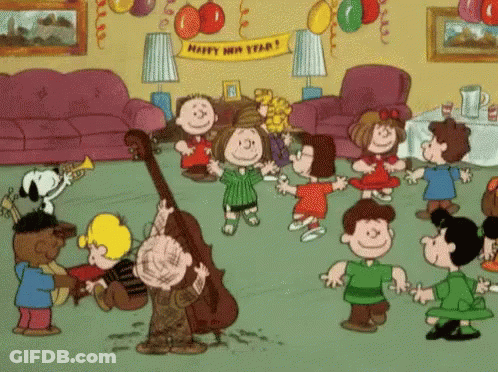 Happy New Year Banner Over Dancing Children GIF