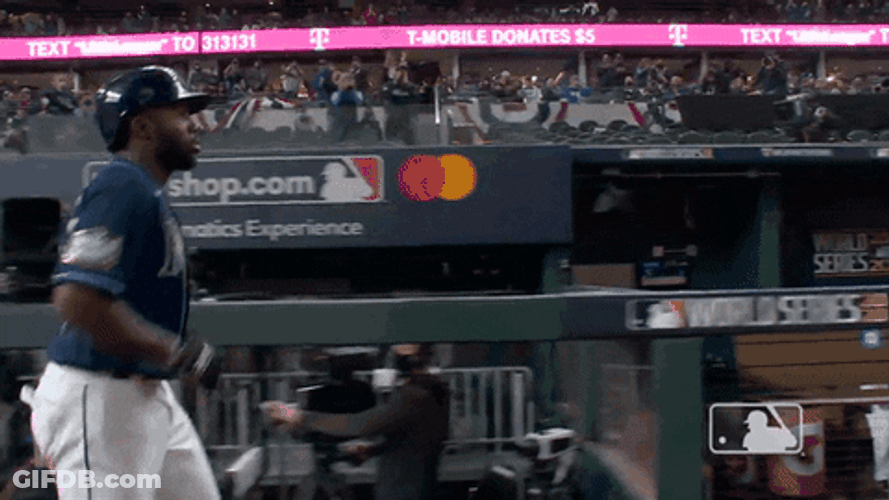 Happy Randy Arozarena Spinning Jump GIF