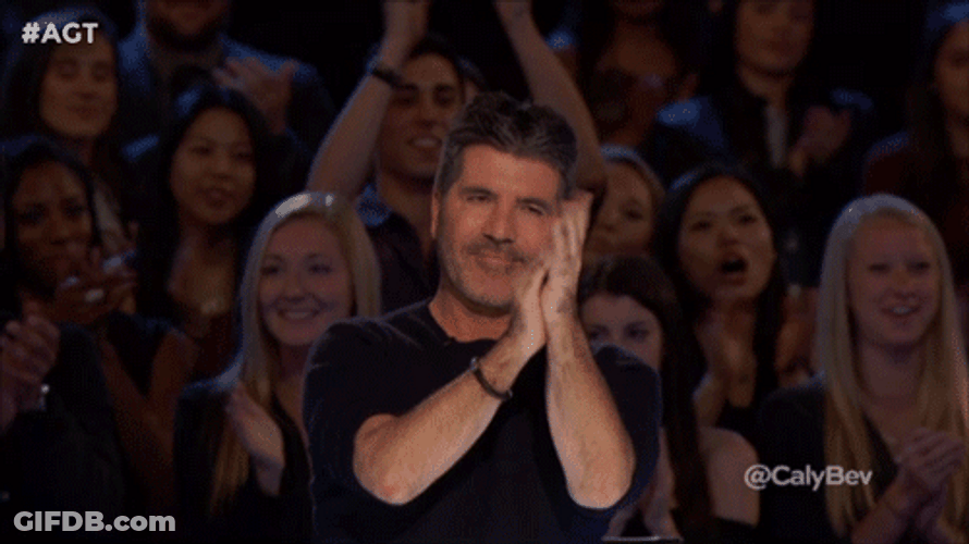 Happy Simon Cowell Okay Sign GIF