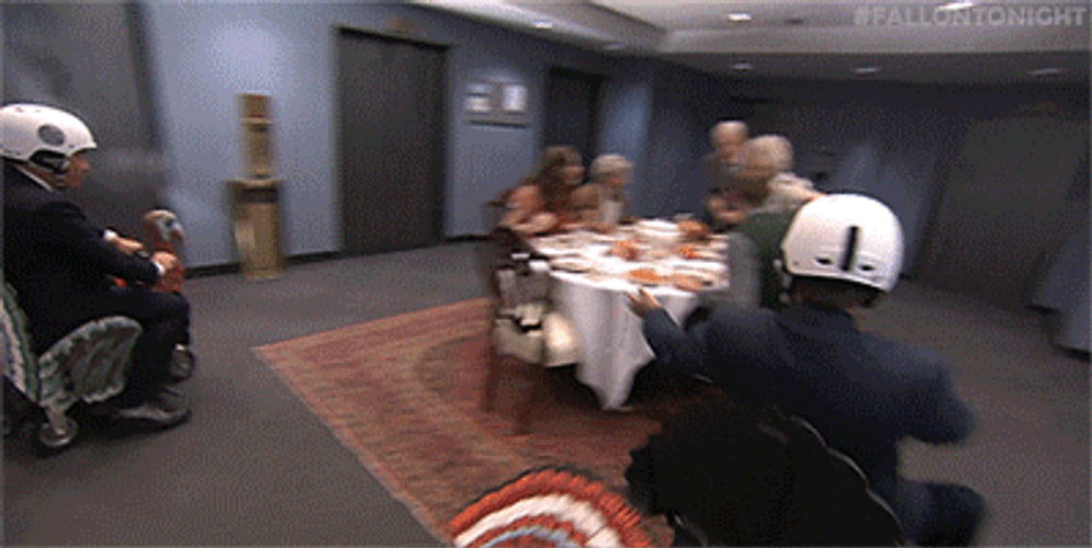 Happy Thanksgiving Riding Scooter In Family Dinner GIF