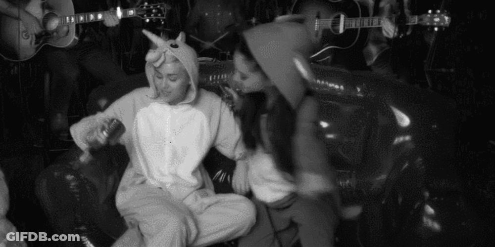 Happy Weekend Ariana Grande Hugs Miley Cyrus GIF