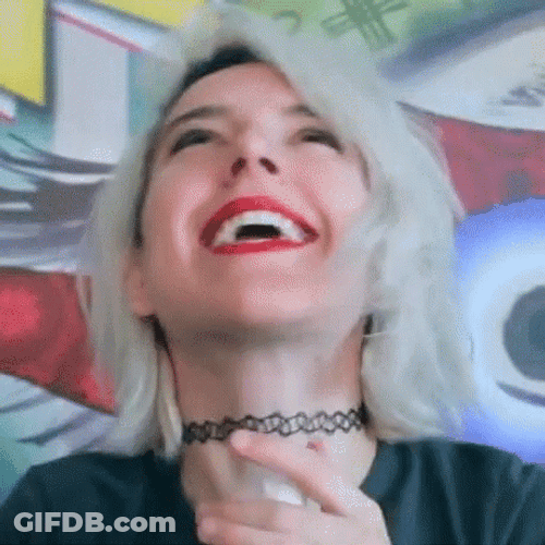 Happy Woman Saying Heaven GIF