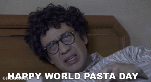 Happy World Pasta Day Curly Haired Glasses Man On Bed GIF