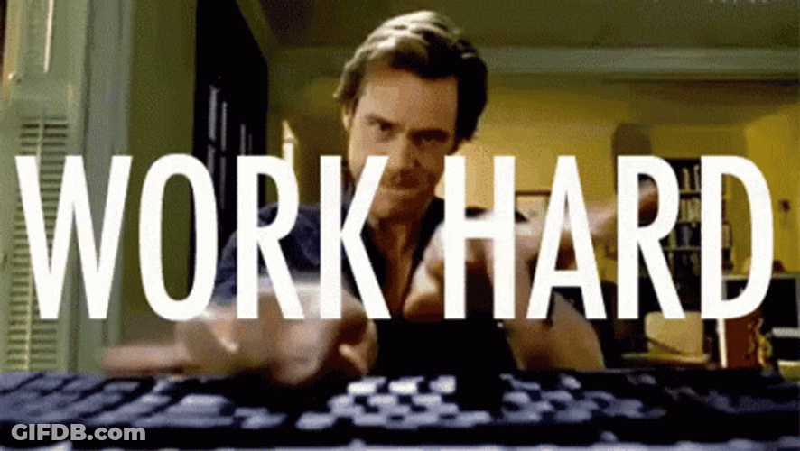 Hardworking Jim Carrey GIF