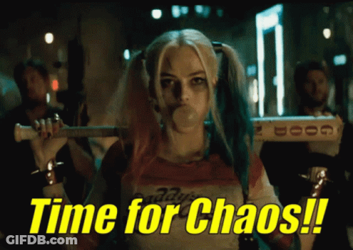 Harley Quinn Blowing A Bubble With The Words Time For Chaos Written Below Her GIF