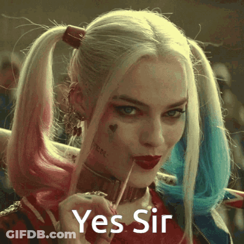 Harley Quinn From Suicide Squad Is Holding A Lollipop In Her Mouth And Says Yes Sir GIF